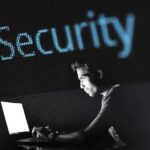 Graphic illustrating the Five Eyes alliance AI cyber risk warnings and generative model security threats